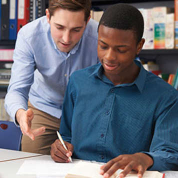 Tutor talking to student